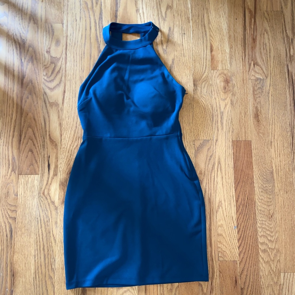 Emerald green halter top and open back dress.